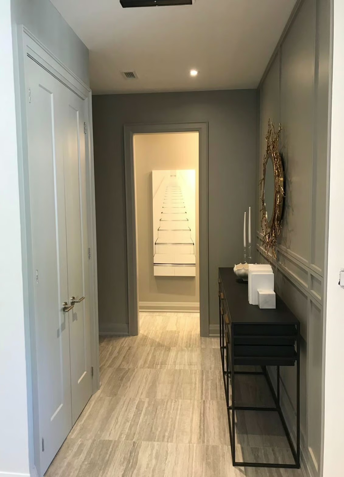 Residential hallway with detailed trim and paint finish